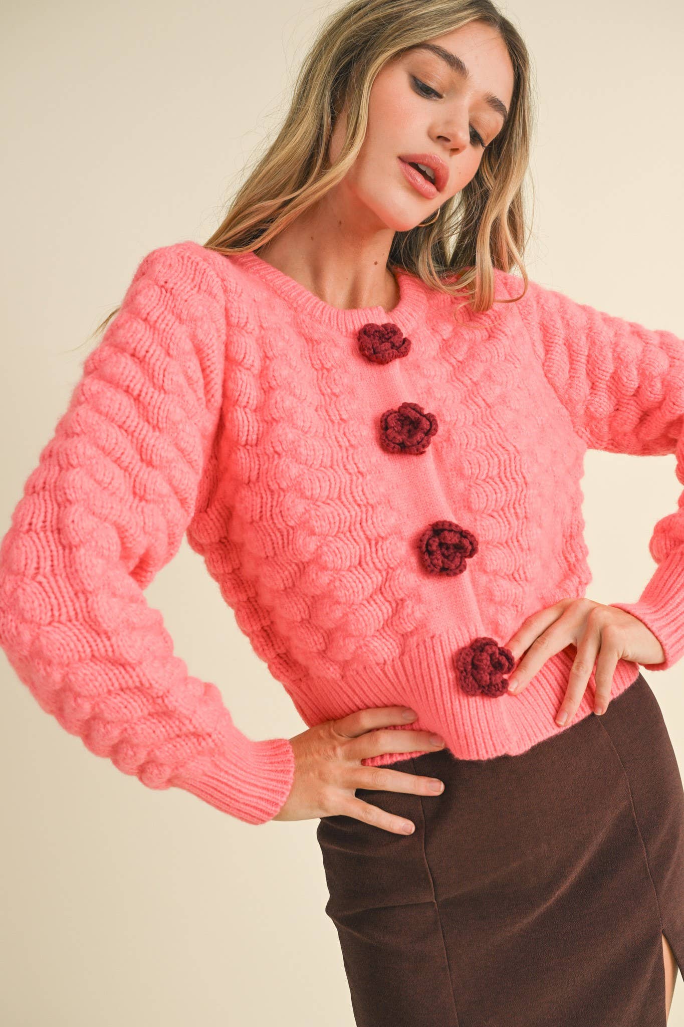CORAL TEXTURED SWEATER CARDIGAN WITH KNIT ROSETTE