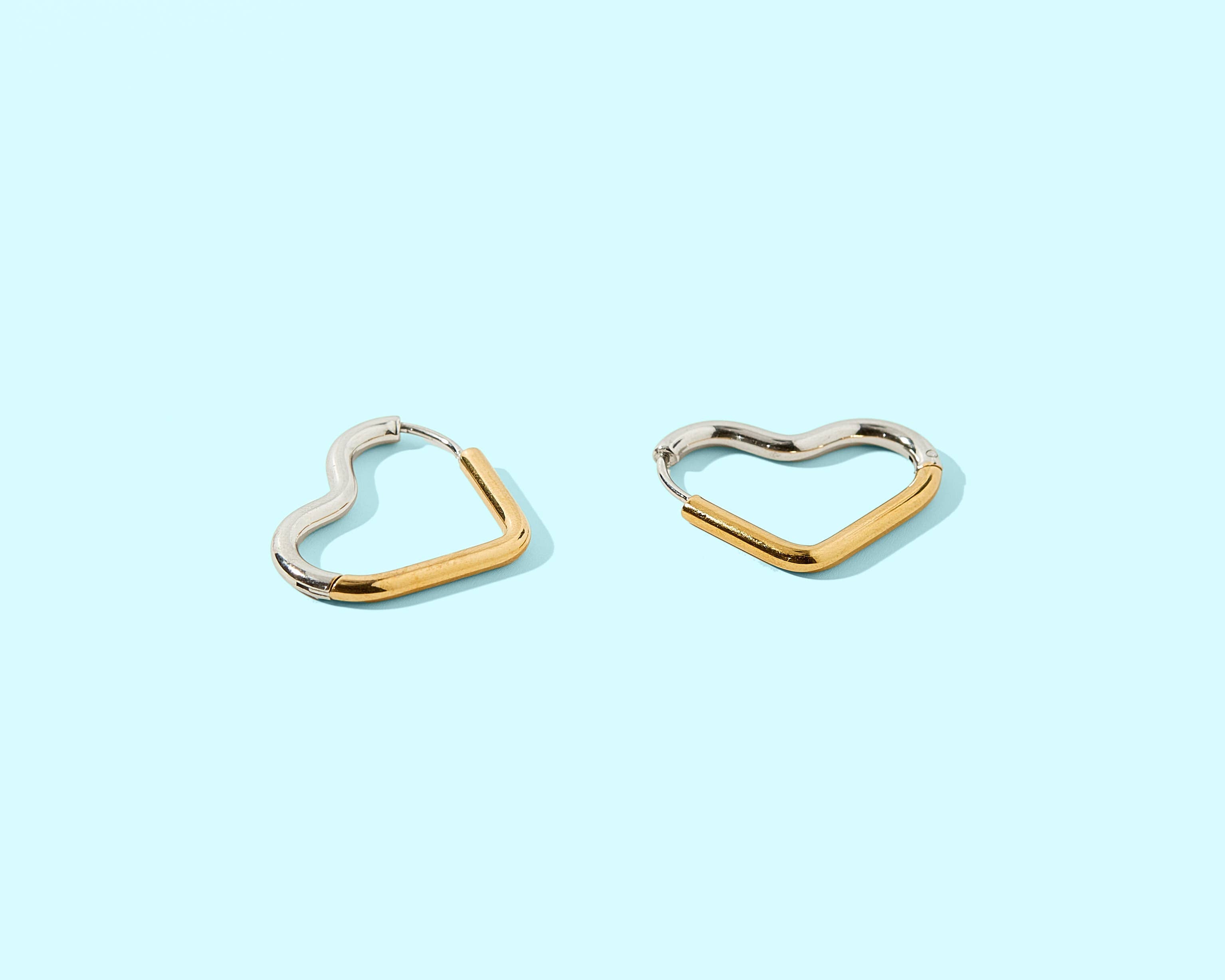 Florence Huggie Earrings | Two-Tone Gold + Silver Hearts