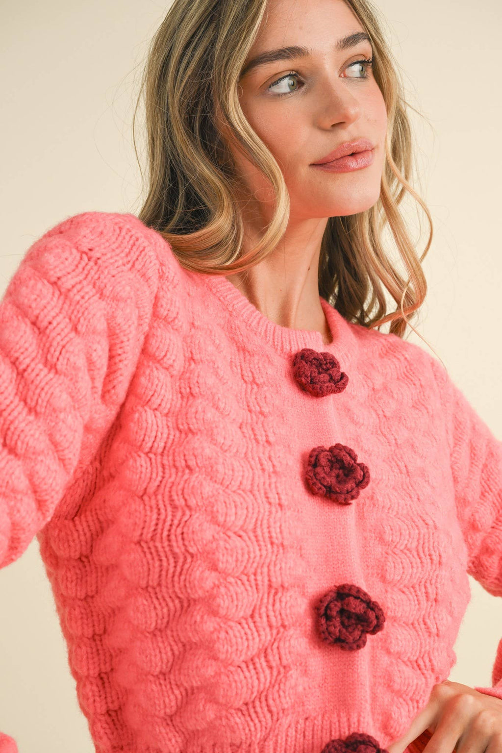 CORAL TEXTURED SWEATER CARDIGAN WITH KNIT ROSETTE