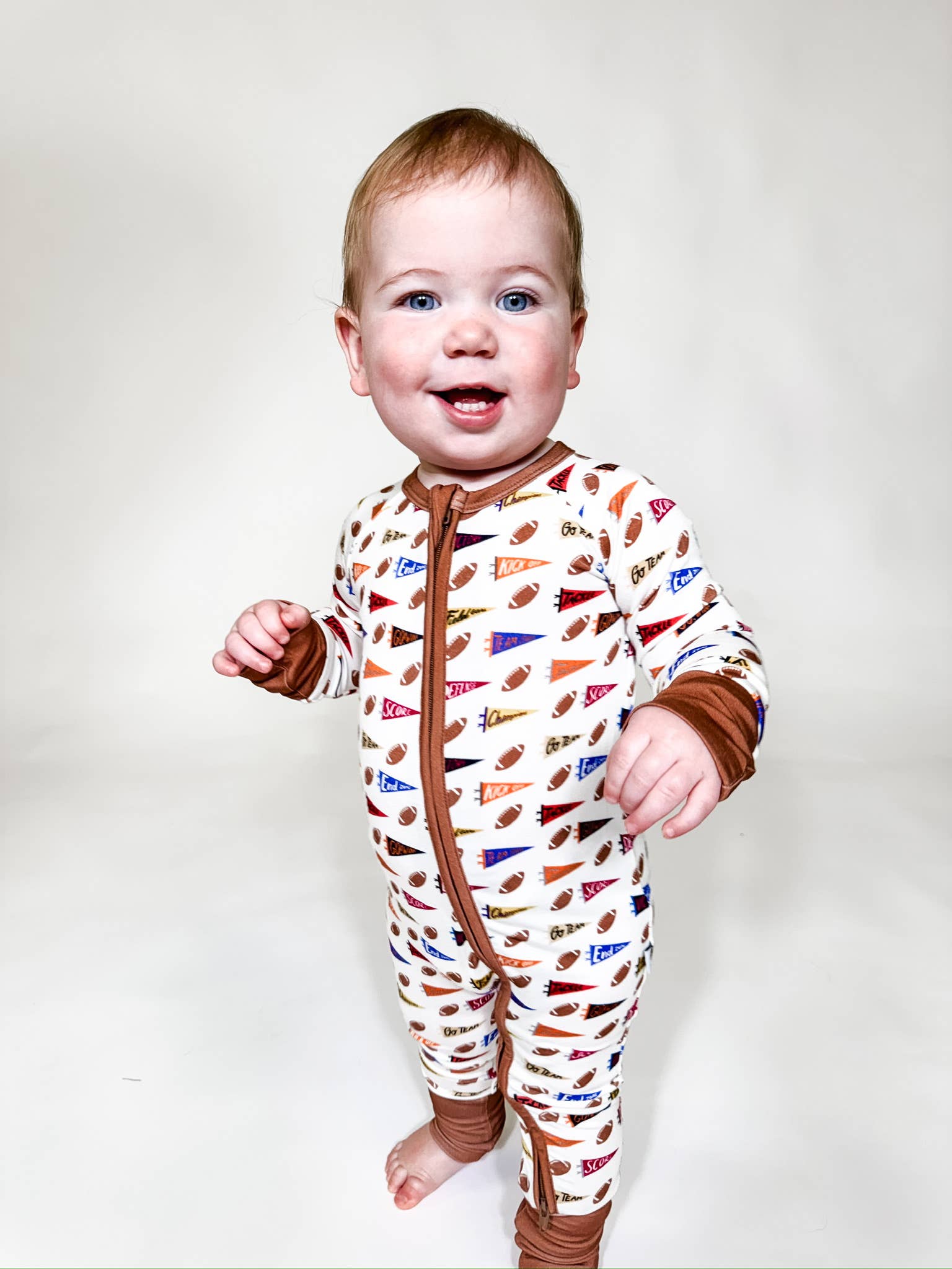 Varsity Football Flags Convertible Zip Sleep Romper
